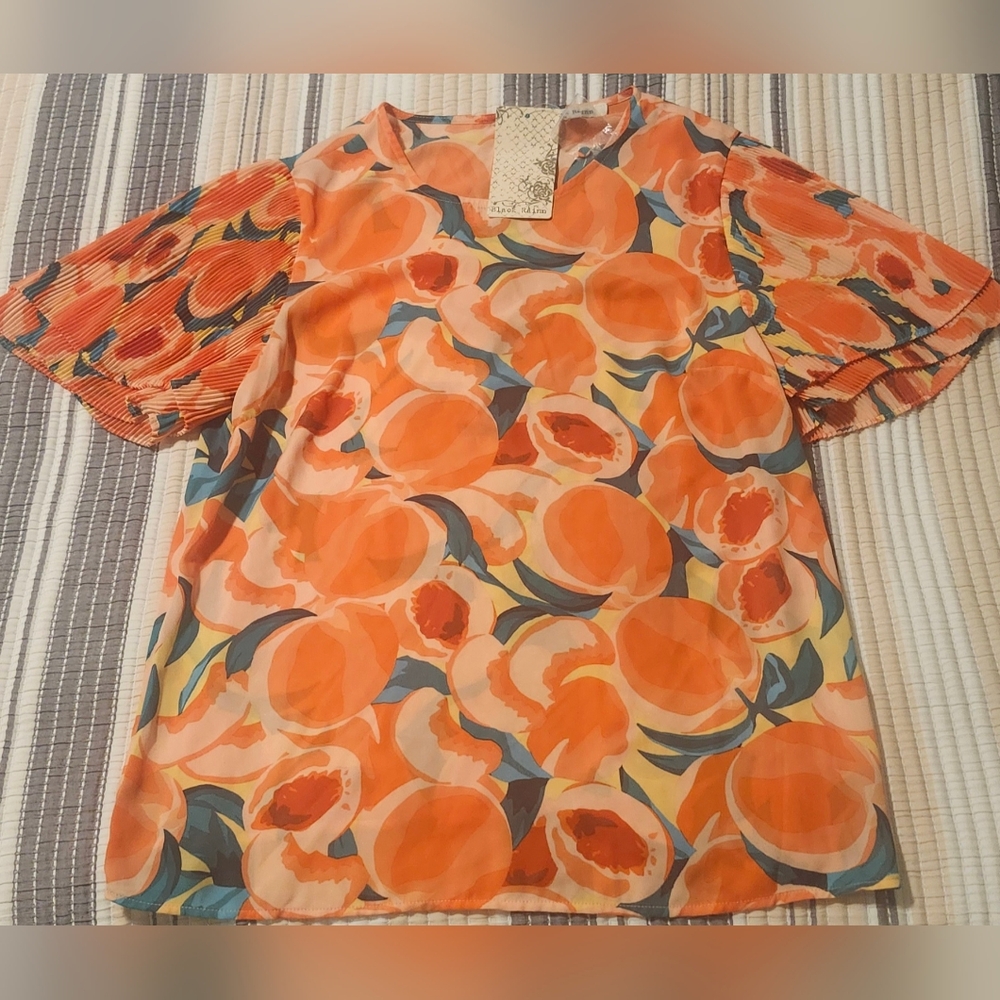 Ladies Blouse brand new Black Rain is the brand size medium